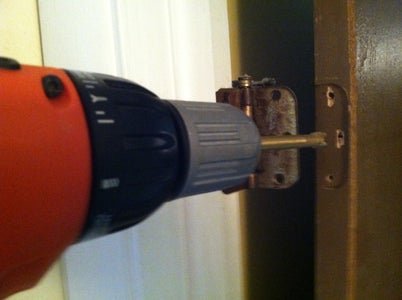 How To Use A Screwdriver Bit To Ream Out Stripped Hinge Holes (Temporarily)