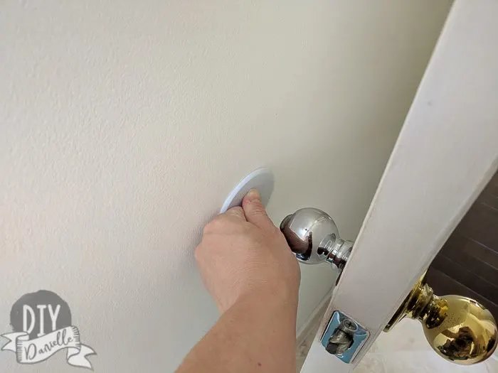 Installing A New Door Stop When The Old One Tore The Wall