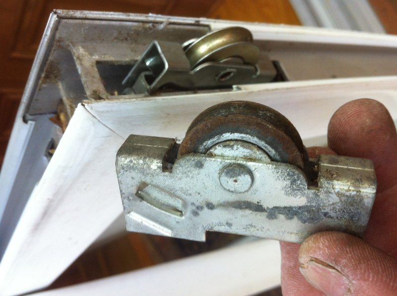 Repairing A Broken Roller Assembly On A Heavy Duty Sliding Door
