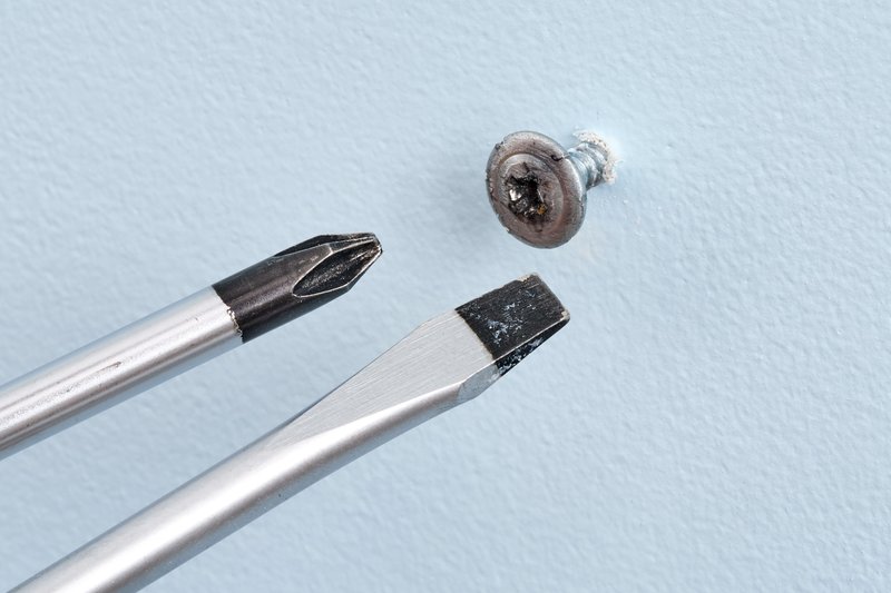 Troubleshooting A Stripped Screw Head When Removing Door Hardware