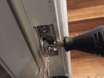 Using A Rotary Tool For Fine Adjustments On Door Hardware (E.G., Strike Plate)