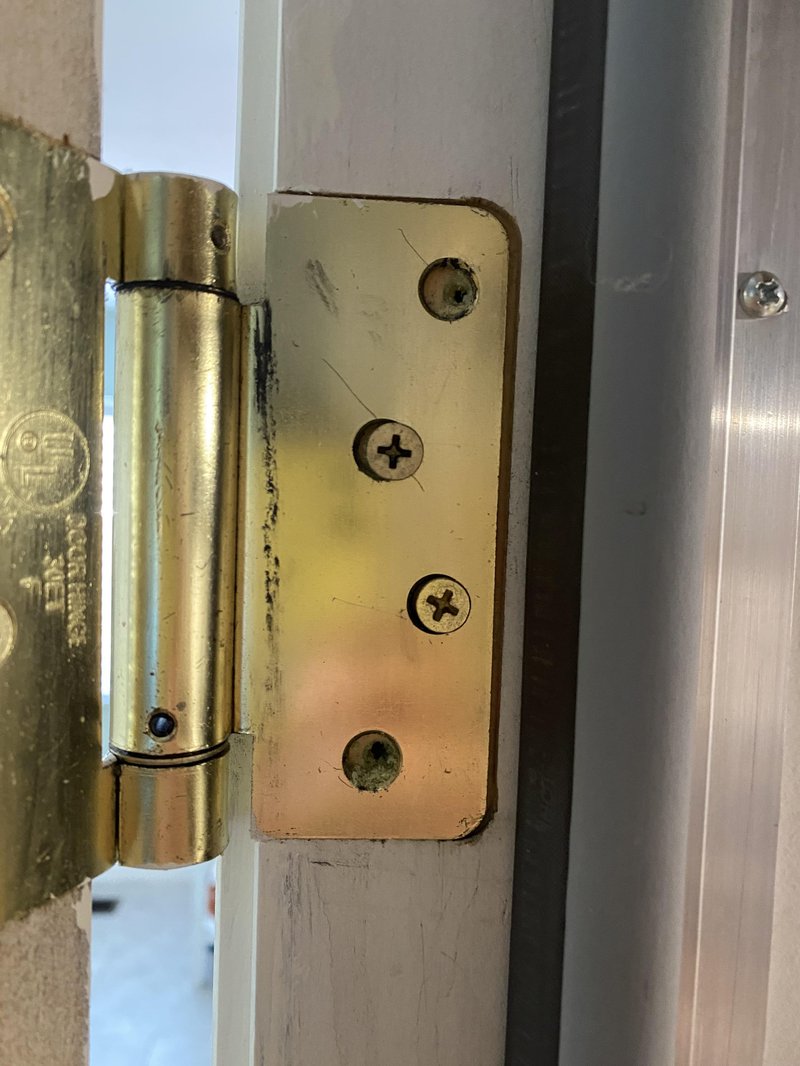 Why Is My Door Hinge Loose Even After Tightening Screws?
