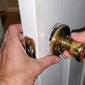 Why Is My Door Latch Bolt Not Retracting Due To Internal Debris?